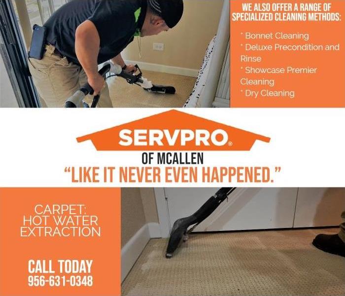 technician extracting water from carpet servpro employee 